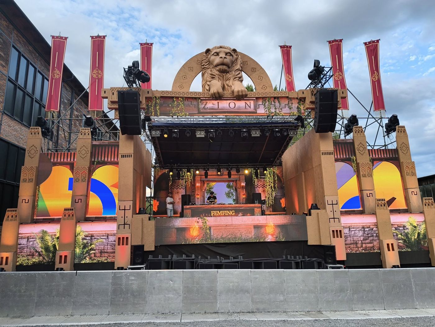 Festival main stage with set pieces and PA
