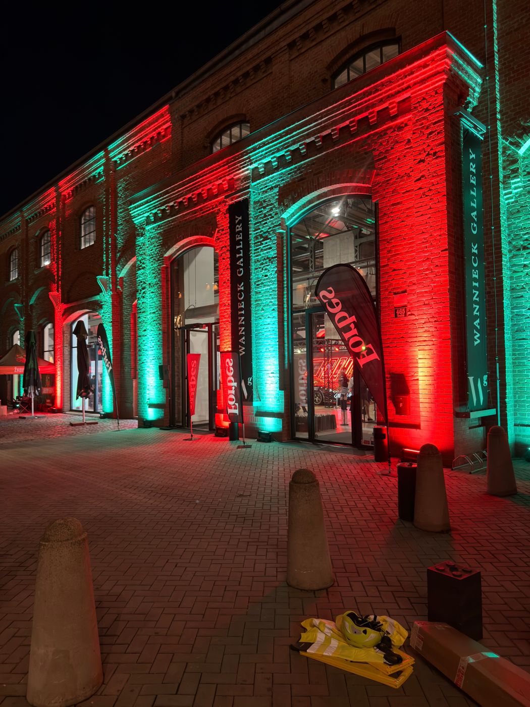 Lit facade of a historic hall