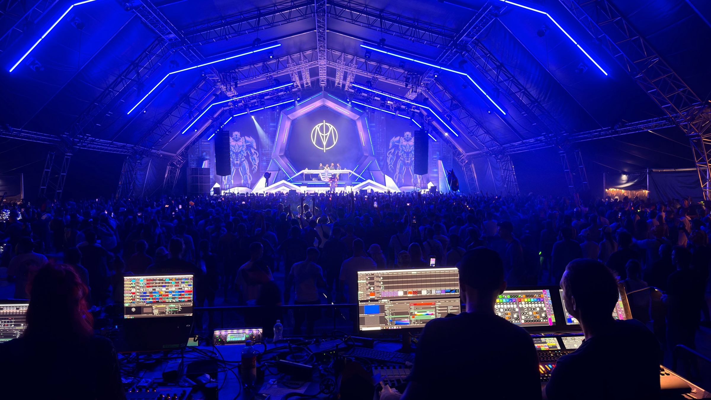 View from the control position to the stage and crowd in blue light